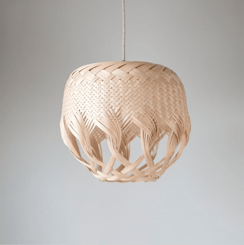 A woven ceiling pendant by Louise Tucker.