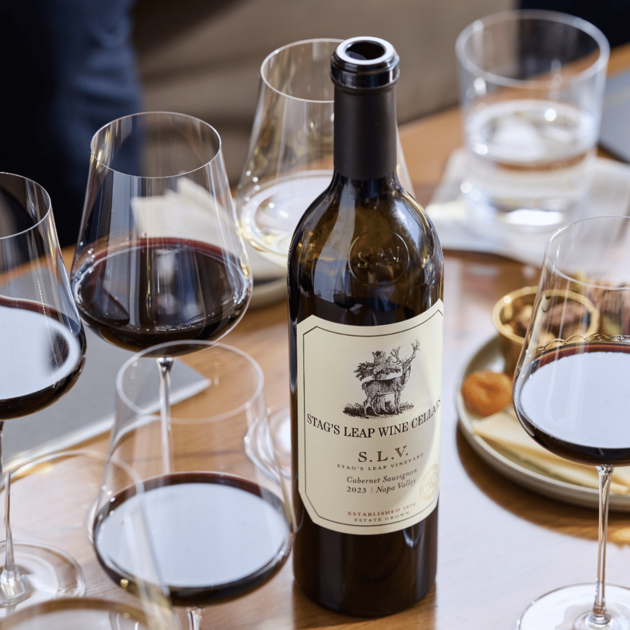 stags leap wine bottle and glasses of wine