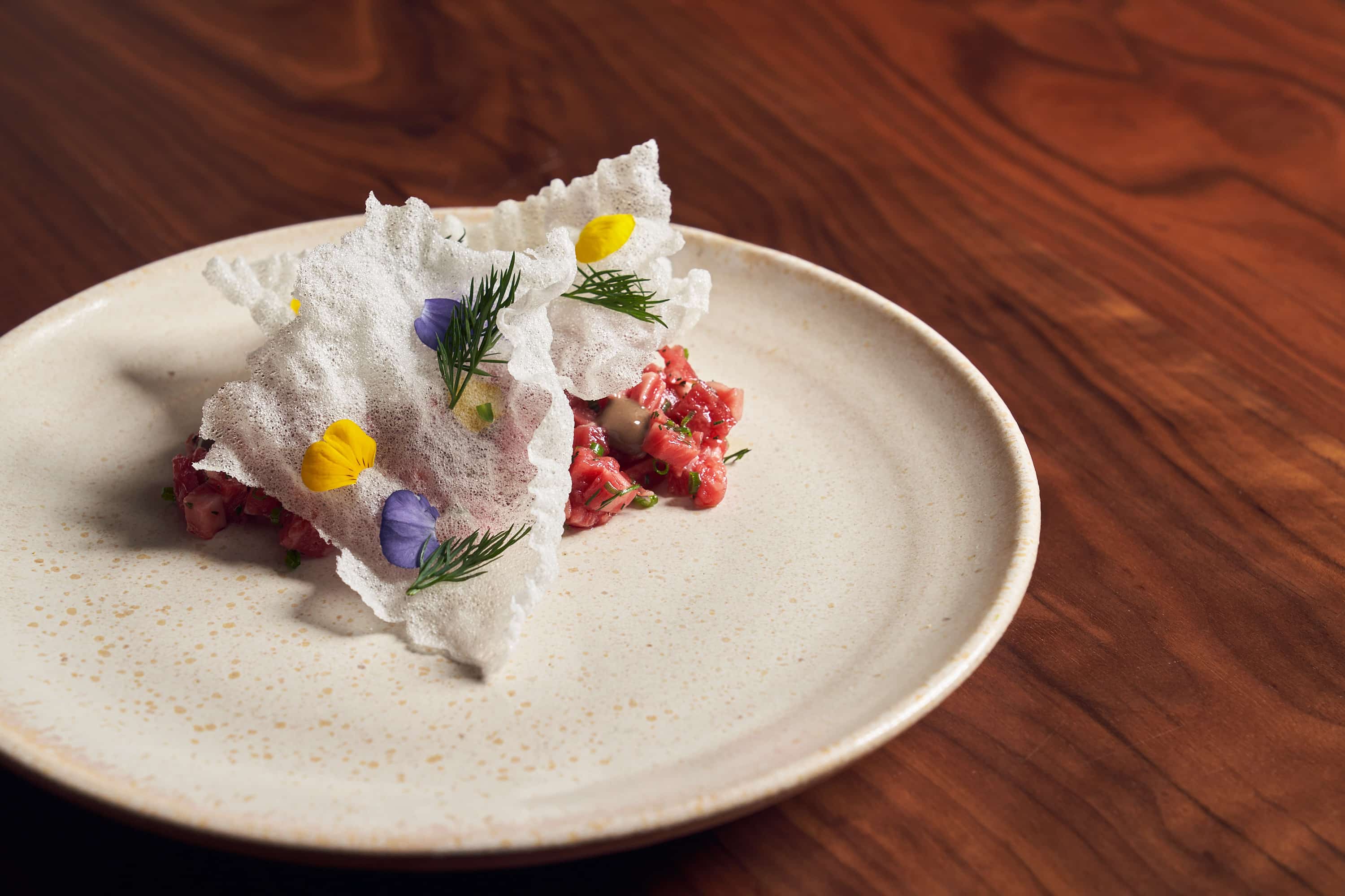 Wagyu Tartare served on a white plate.
