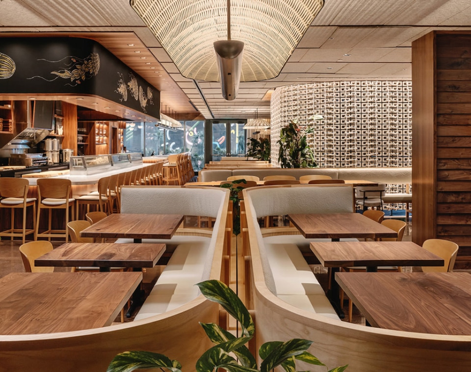A wide angle view of the dining room and the sushi bar at Uchi Miami.